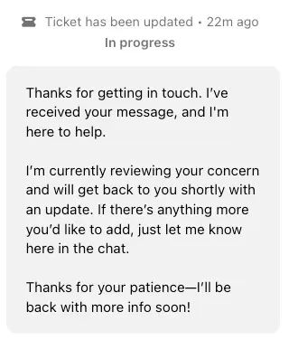 Crown Coins support chat showing a ticket marked In progress and a message from support saying it is reviewing the request
