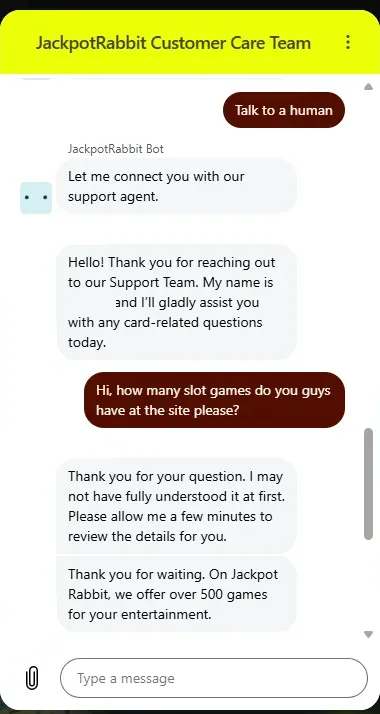 JackpotRabbit Customer Care live chat in which the bot connects the user to a support agent, who says the site offers over 500 games